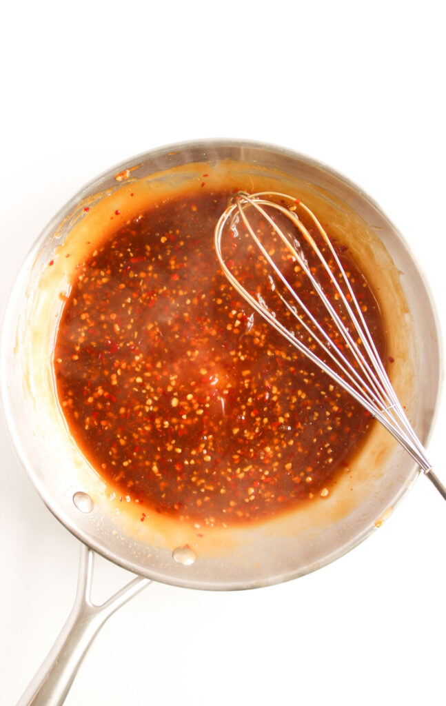 whisk with general tsos chicken sauce