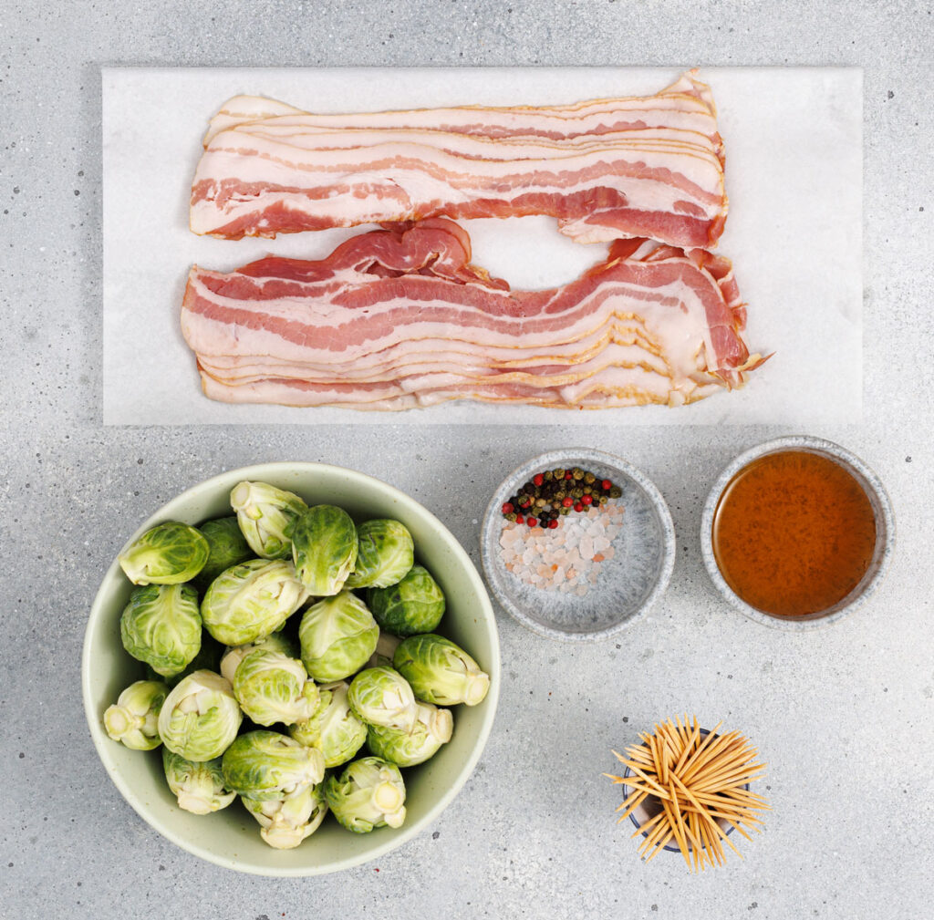 bacon wrapped brussel sprouts ingredients on countertop