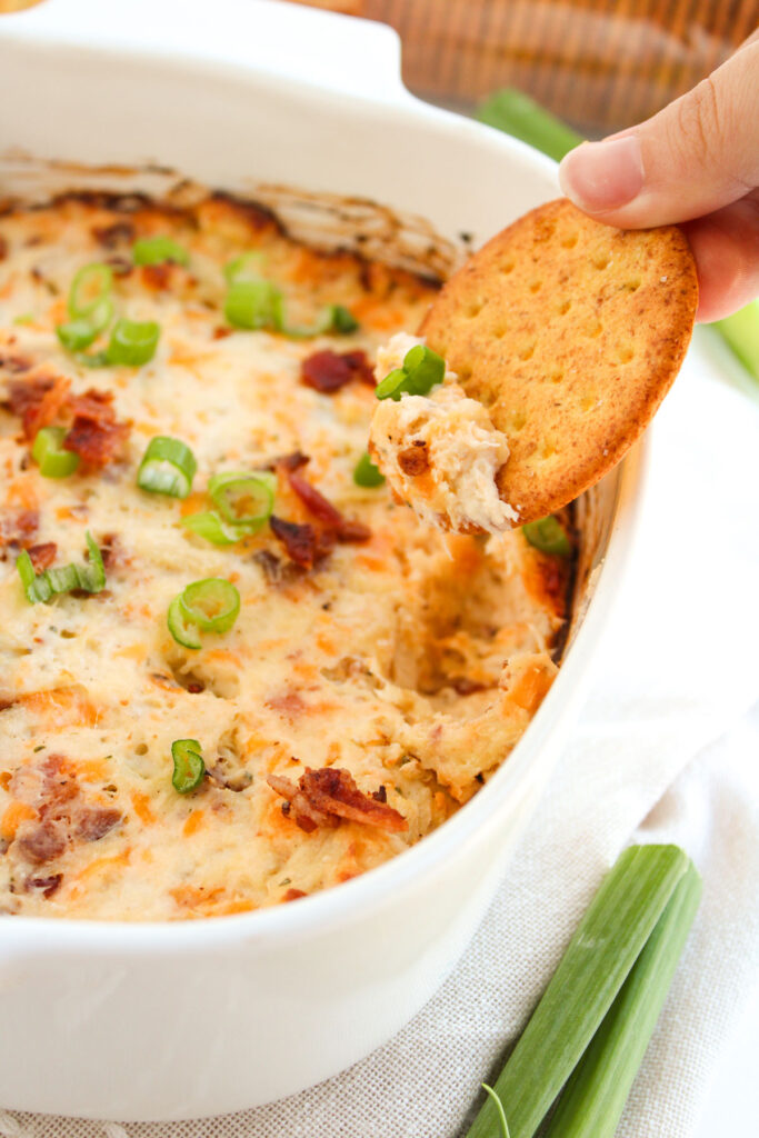 cracker scooping crack chicken dip