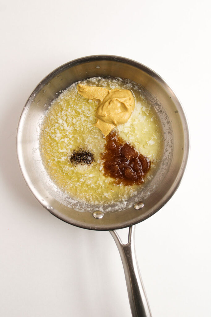 butter, mustard, and brown sugar in pan