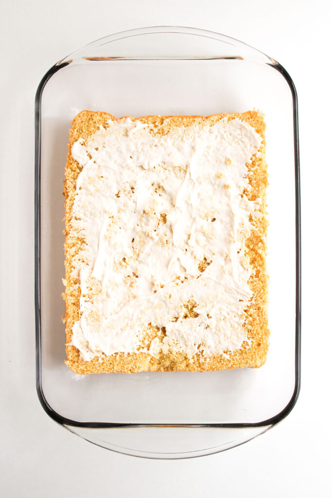 mayonnaise spread over halved Hawaiian rolls