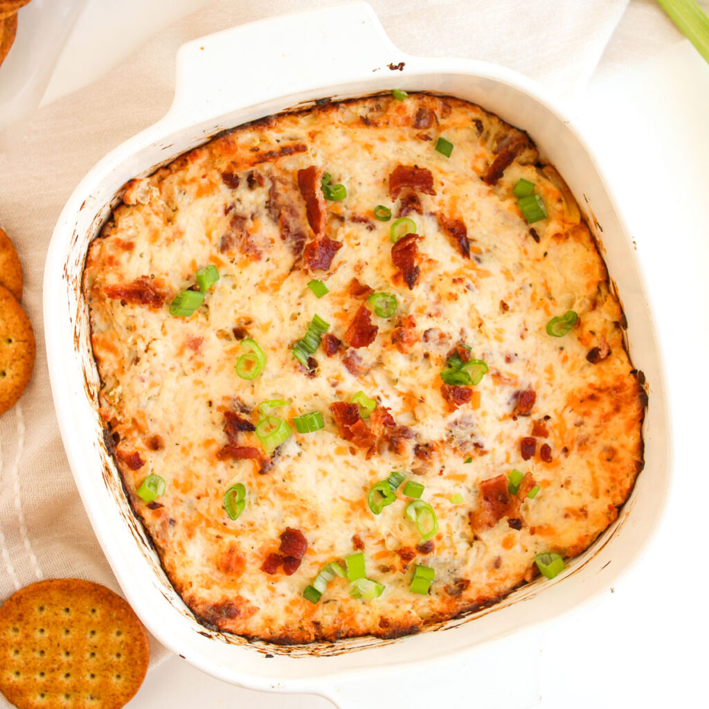 crack chicken dip in white baking dish