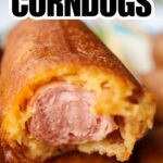 close up of corn dog with bite removed and homemade corndog recipe name overlay