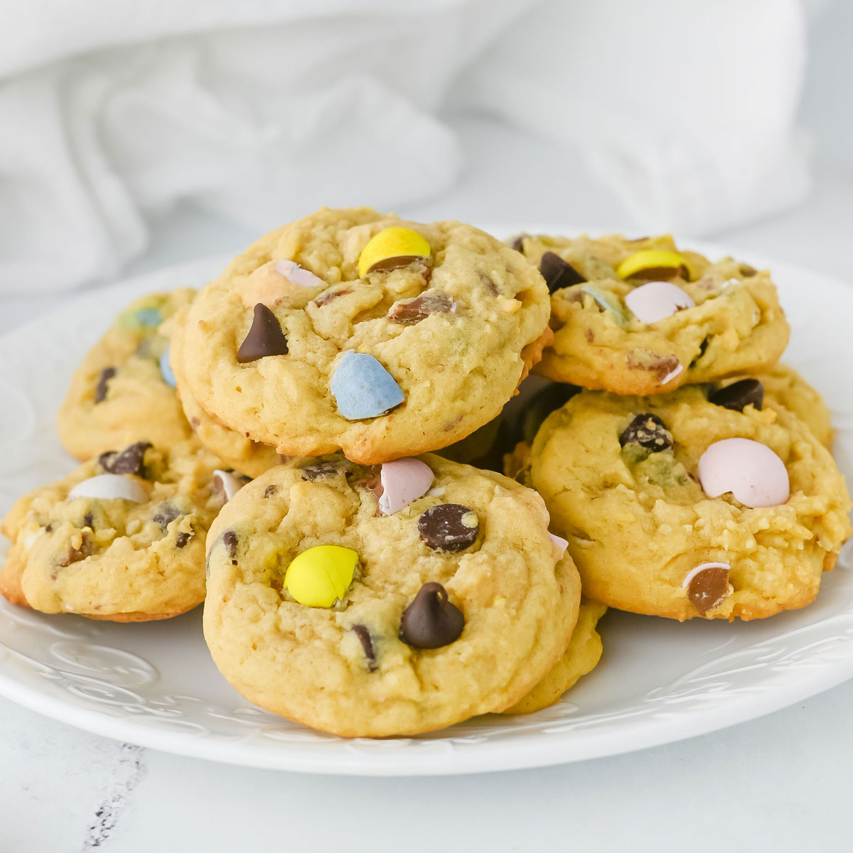 cadbury egg cookies on white plate
