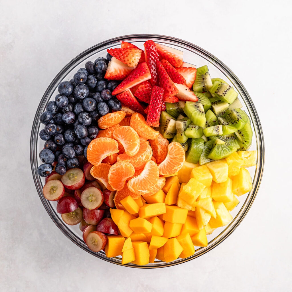 cut fresh fruit in glass bowl