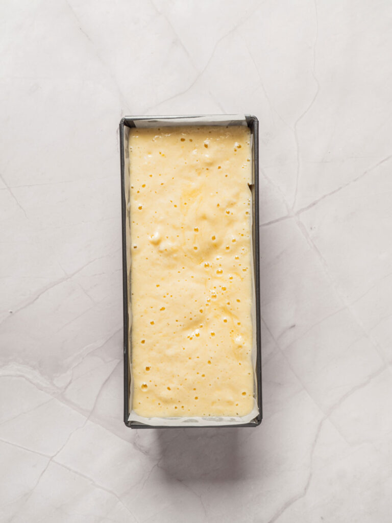 lemon loaf cake batter in pan