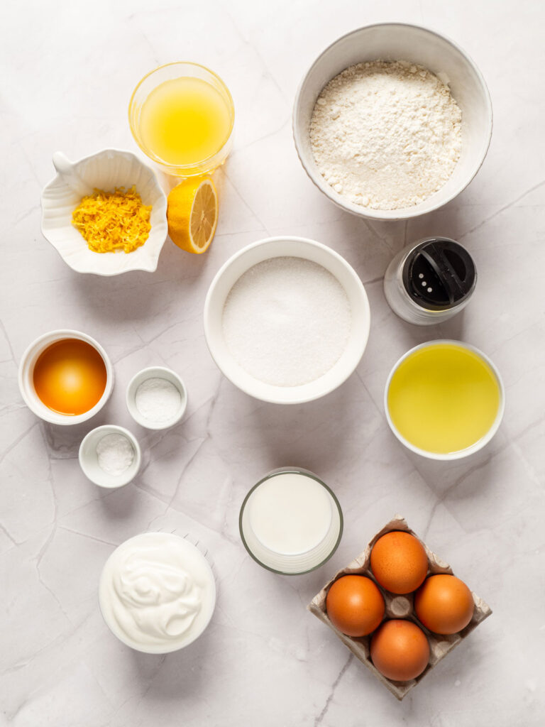 lemon loaf cake ingredients in bowls on countertop