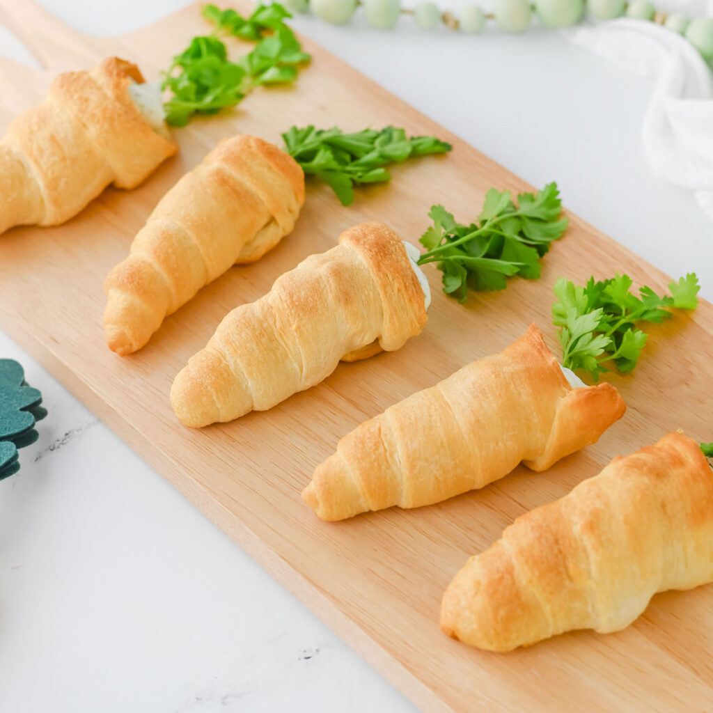 crescent rolls carrots on cutting board