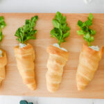 crescent rolls carrots on cutting board