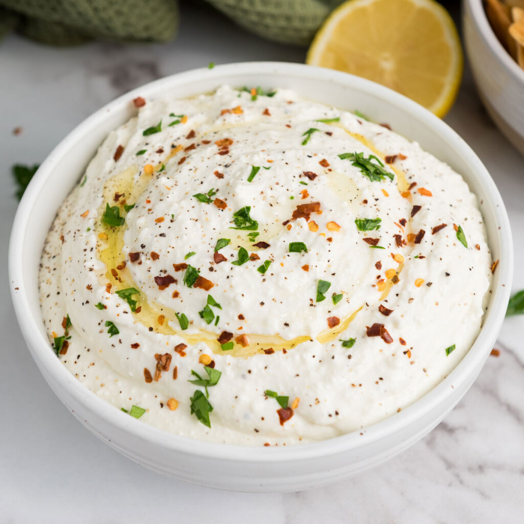 whipped feta dip in white bowl