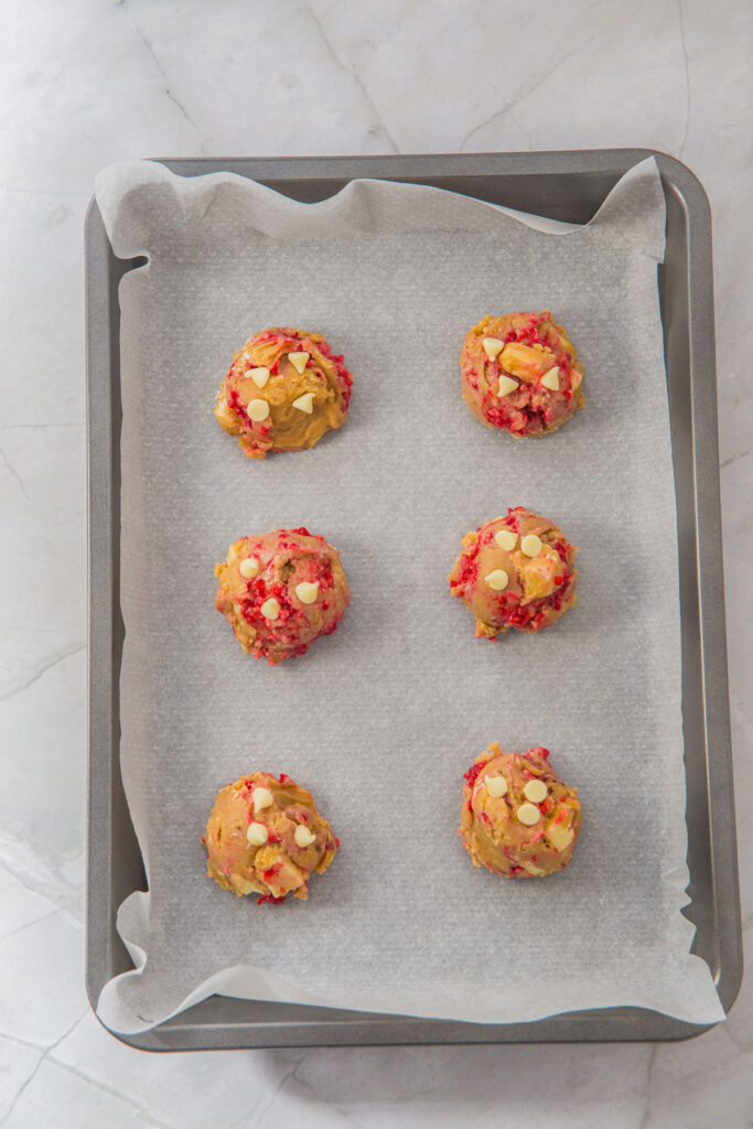 White Chocolate Raspberry Cookies dough balls on cookie sheet before baking
