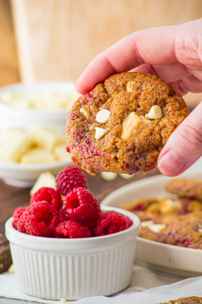 hand holding White Chocolate Raspberry Cookie
