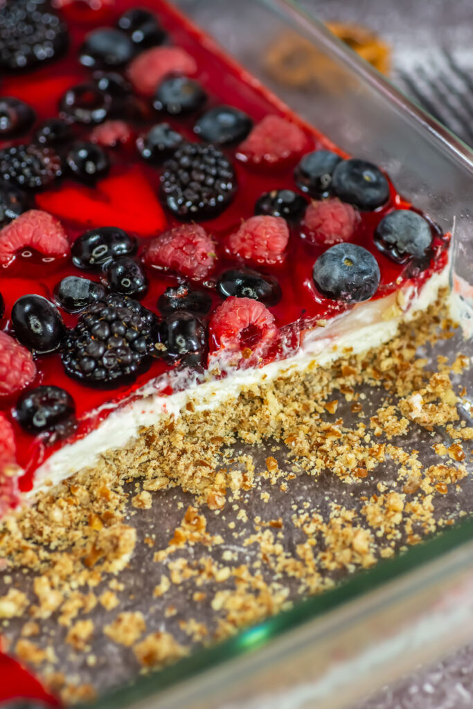 pretzel berry salad with three slices removed