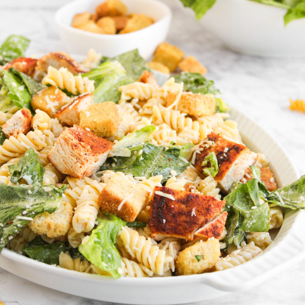platter of chicken caesar pasta salad