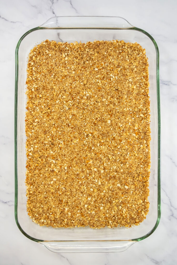 pretzel crust in casserole dish for pretzel berry salad