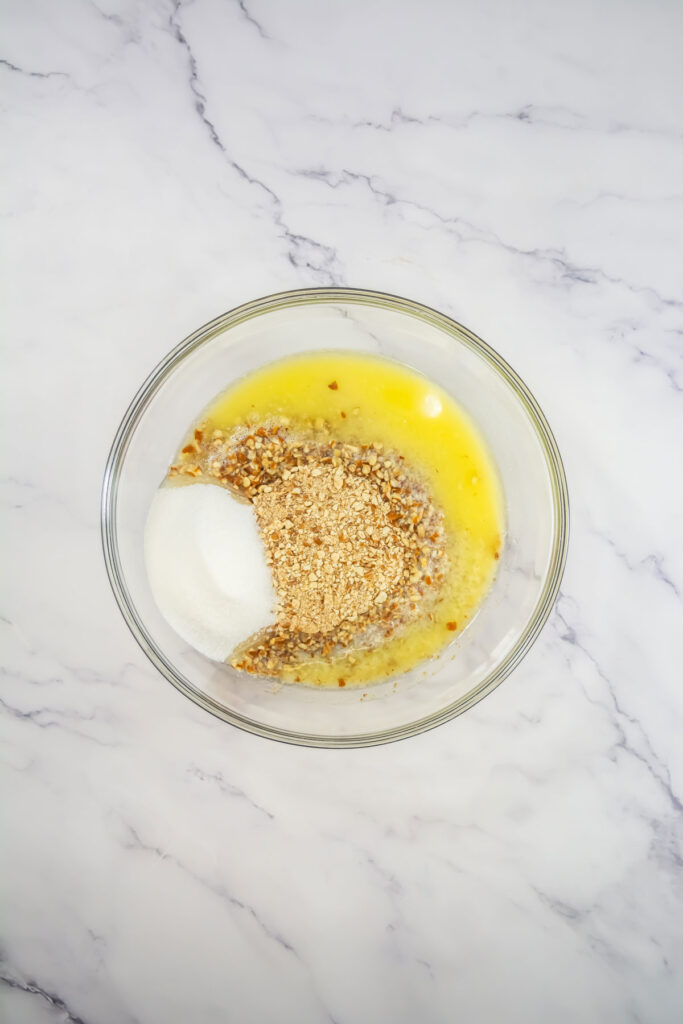 pretzel berry salad crust ingredients in glass bowl