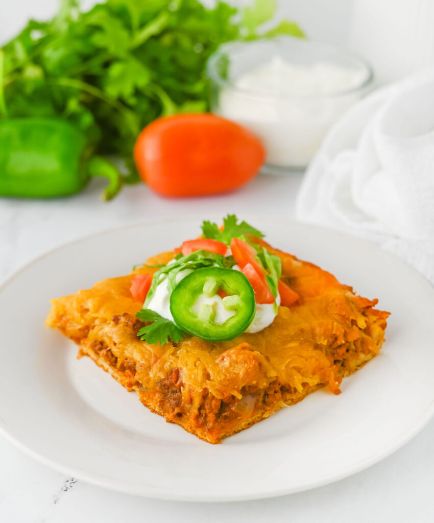 portion of crescent taco bake on white plate