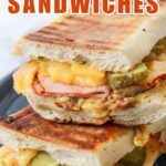 two cuban sandwiches with recipe name overlay