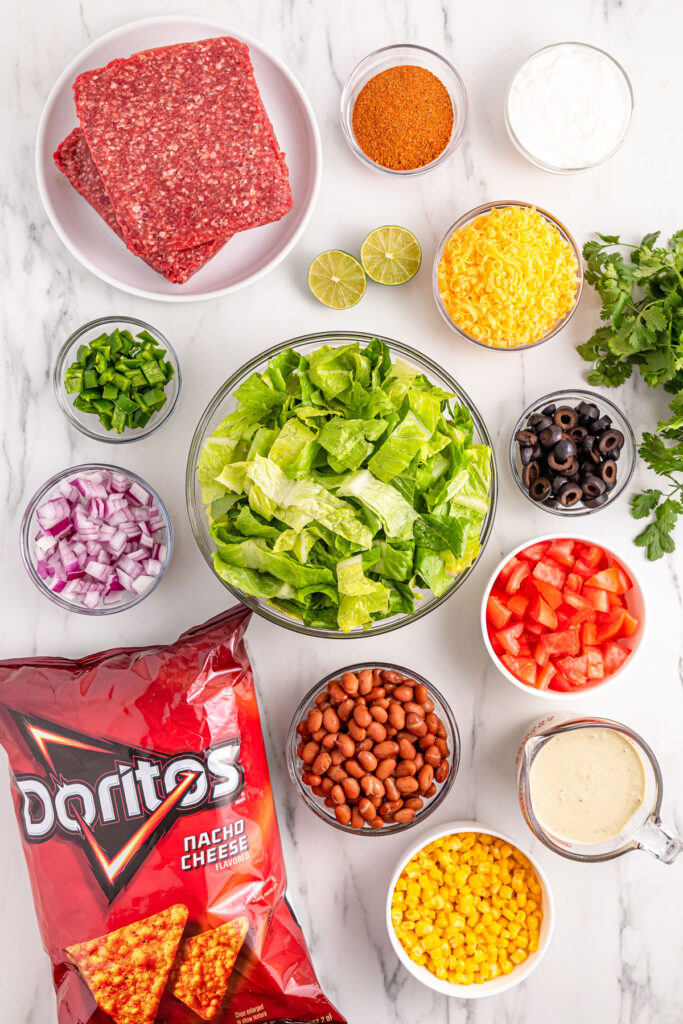 Doritos taco salad ingredients on countertop