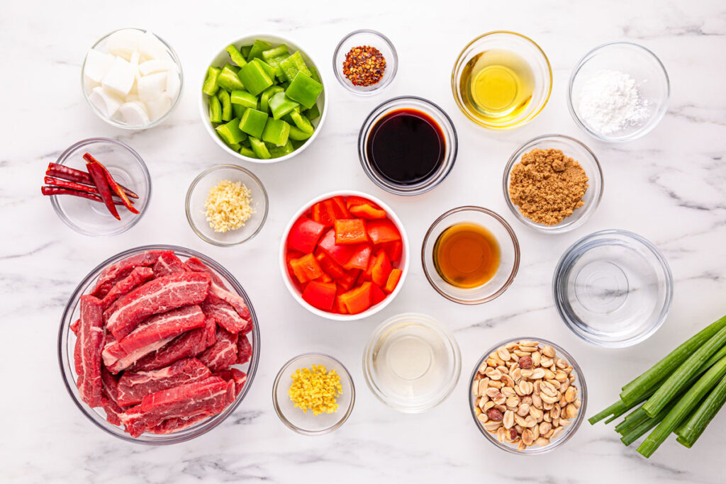 kung pao beef ingredients in bowls on countertop