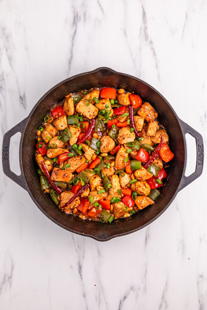 cast iron pan with kung pao chicken