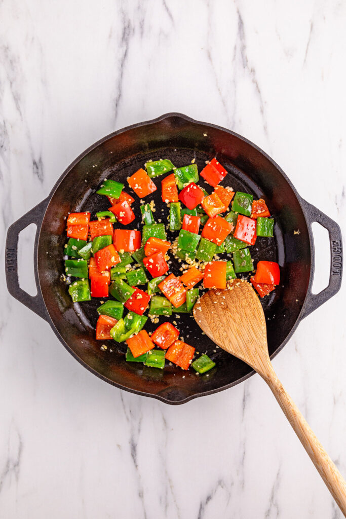 sautéed veggies and garlic in cast iron skillet