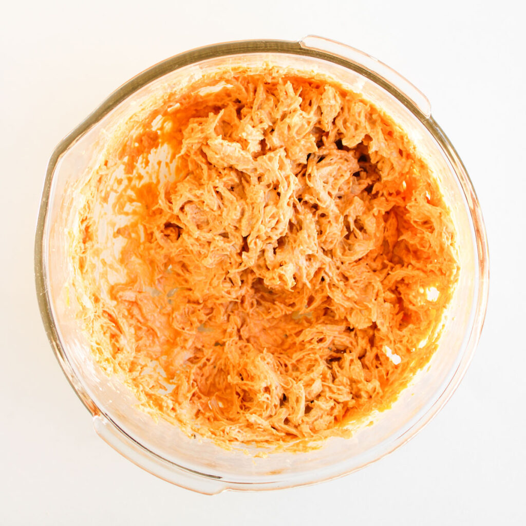 buffalo chicken filling in glass bowl