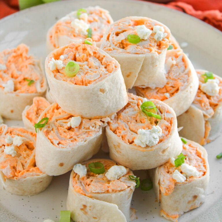 buffalo chicken pinwheels on white plate