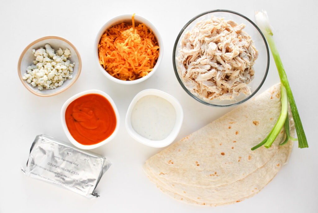 buffalo chicken pinwheel ingredients on countertop