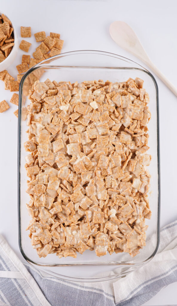 cinnamon toast crunch treats in pan before slicing