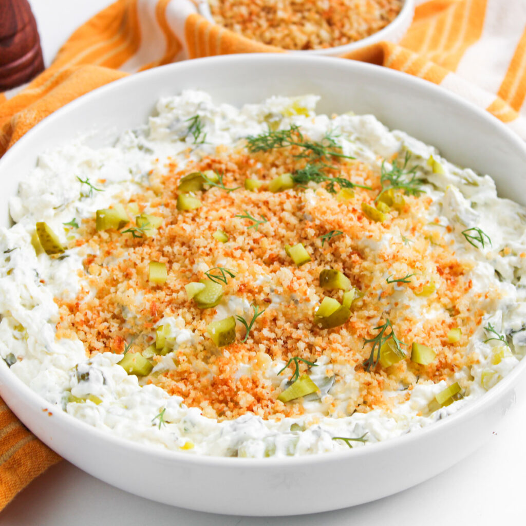 dill pickle dip in white bowl