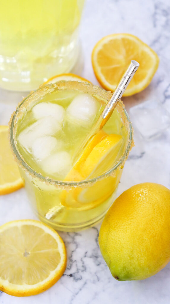 lemonade in glass with straw