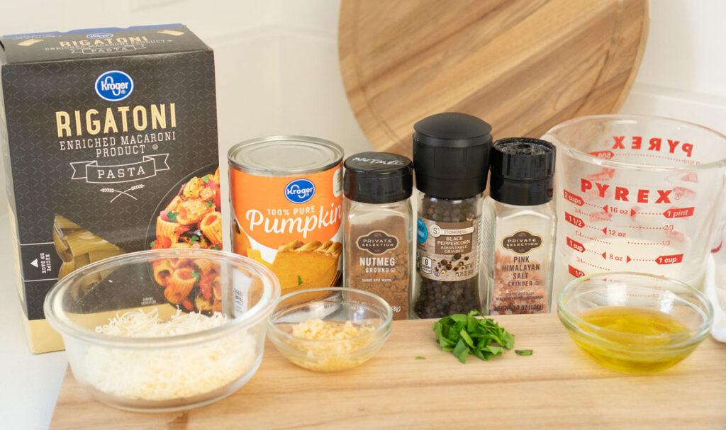 pumpkin pasta ingredients on counter with cutting board