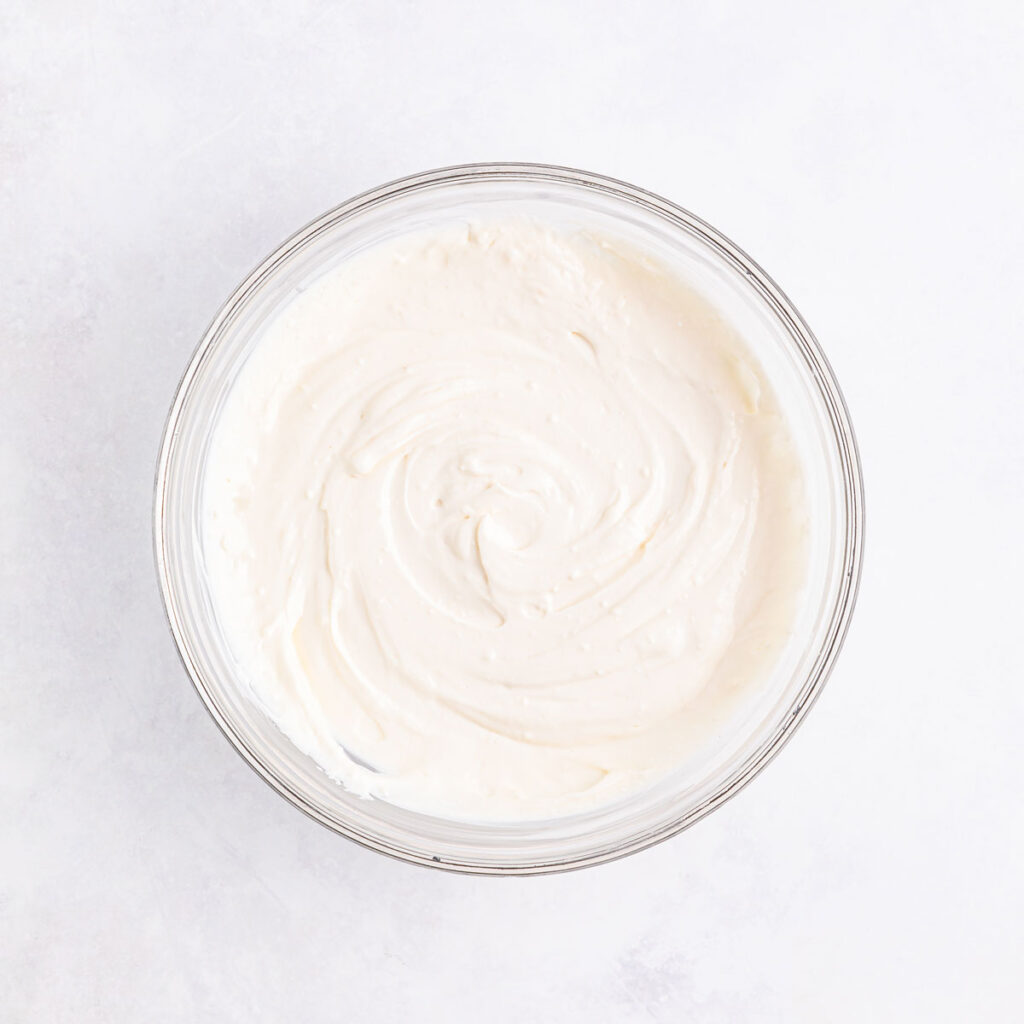 cream cheese dressing for grape salad in glass bowl