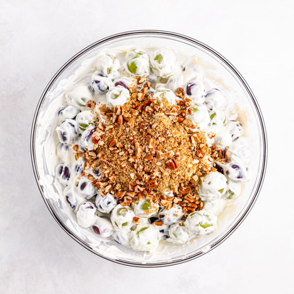 grape salad with nuts and brown sugar on top