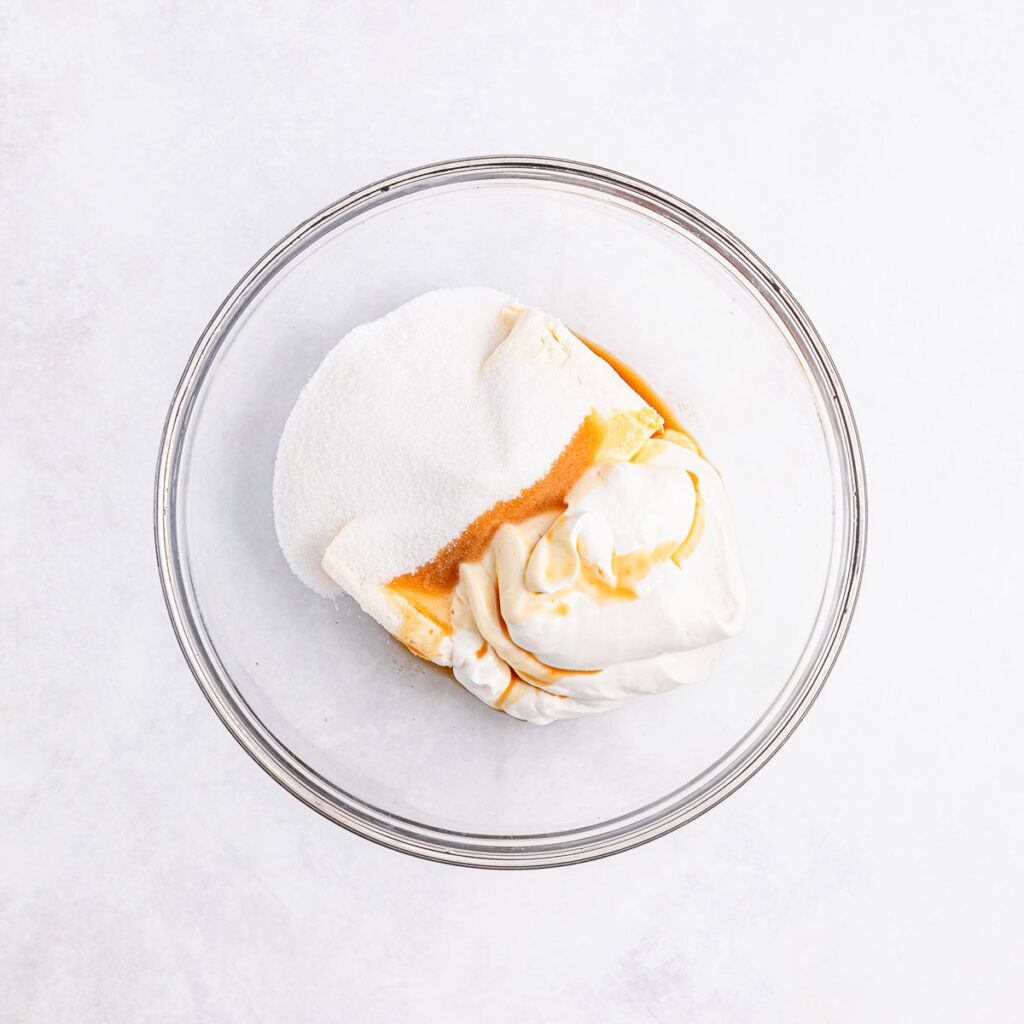 cream cheese and honey in glass bowl for grape salad