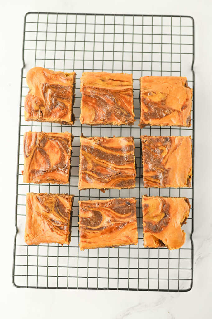pumpkin brownies on wire rack