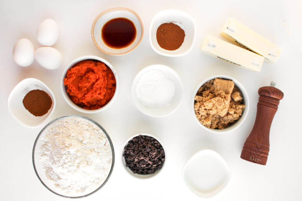 pumpkin chocolate chip muffins ingredients in bowls