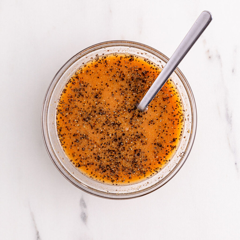 glass bowl with sauce for black pepper chicken