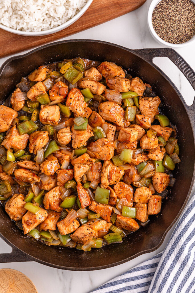 black pepper chicken in cast iron pan