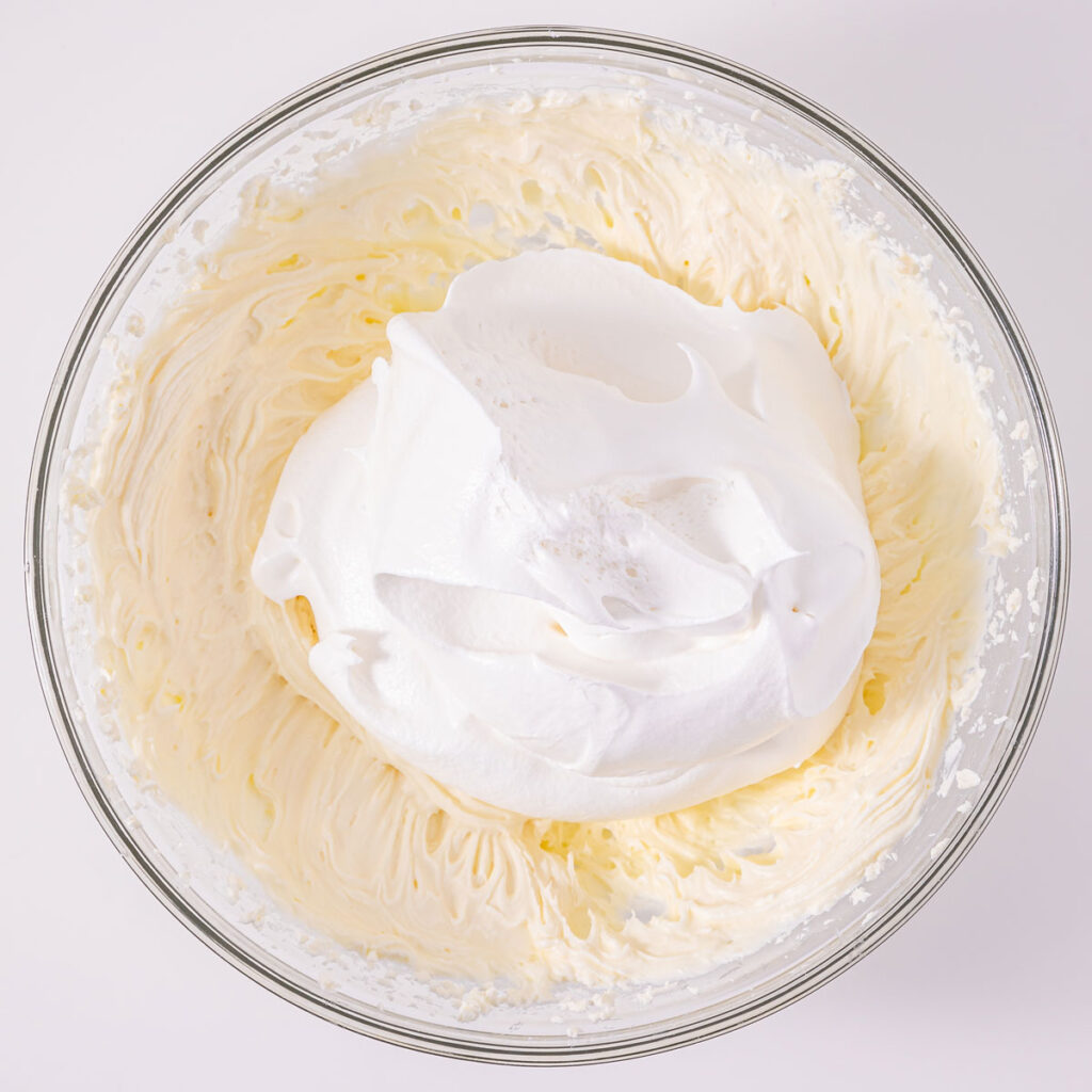 making whipped topping for cherries in the snow