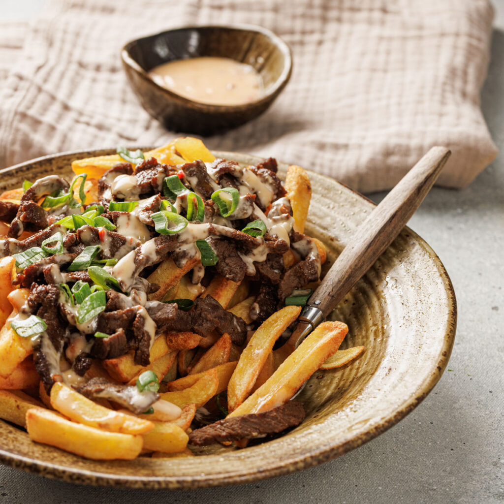korean loaded fries and dipping sauce