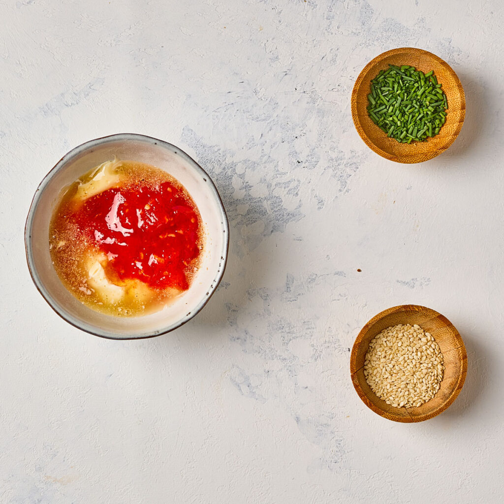 mixing korean meatballs dipping sauce