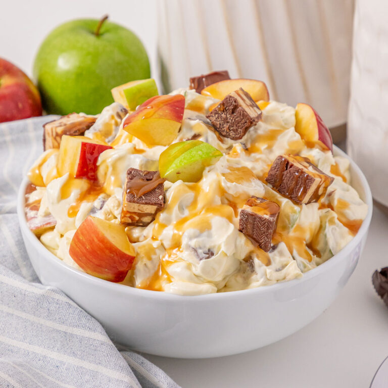 white bowl with snickers apple salad