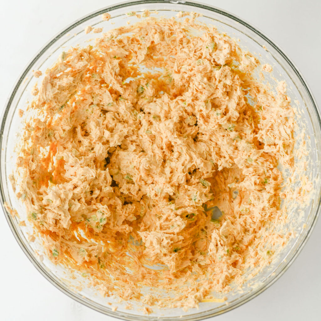 taco cheeseball mixture in glass bowl