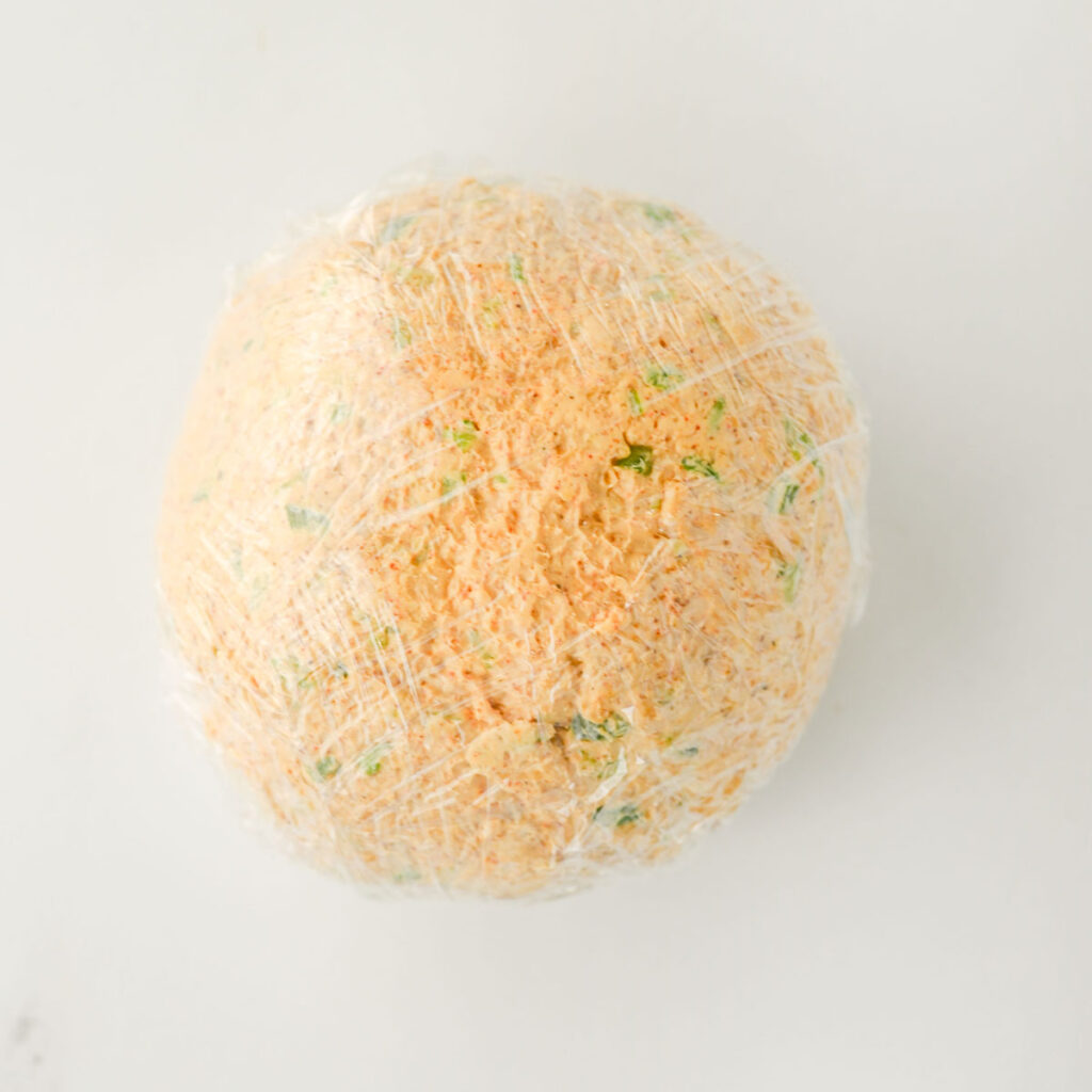 taco cheeseball wraped in saran wrap