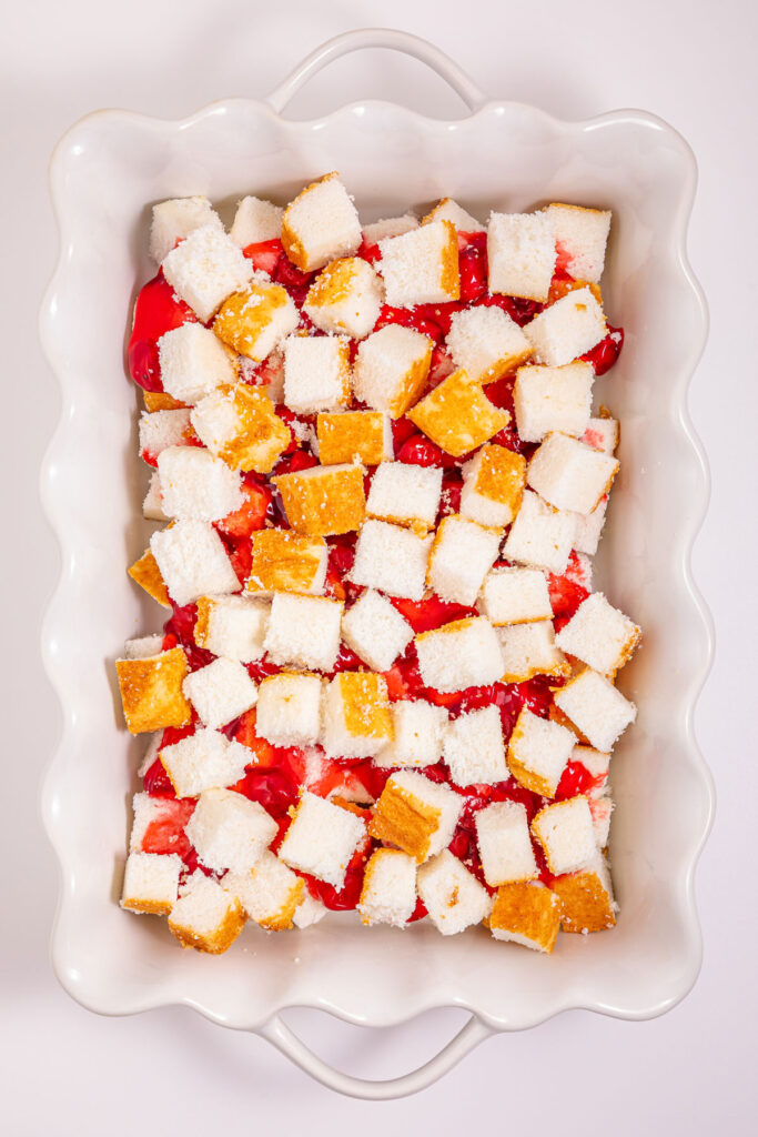 angel food cake cubes over cherry pie filling for heaven on earth cake