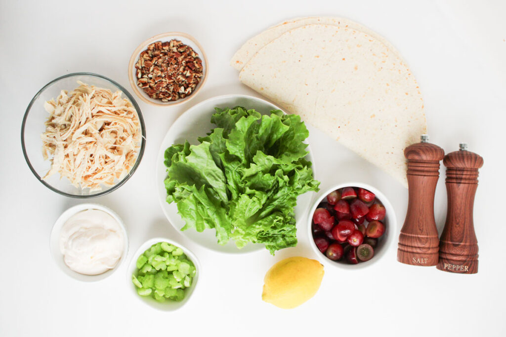 chicken salad pinwheels ingredients in bowls on countertop