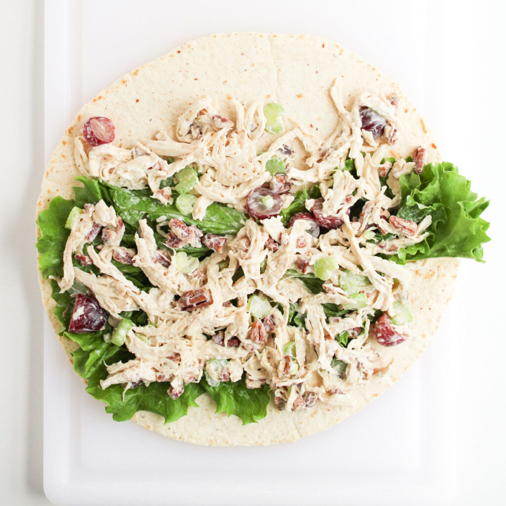 chicken salad with lettuce on tortilla