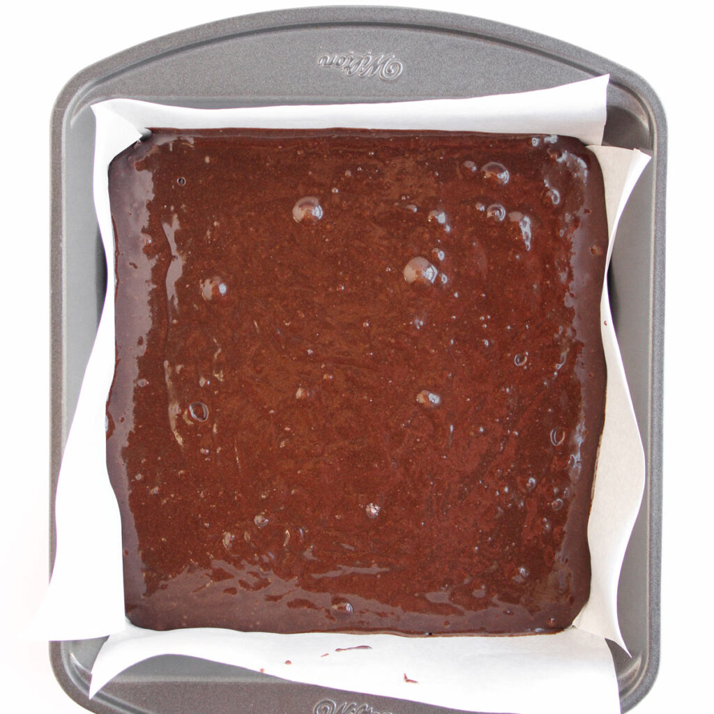brownie batter in pan before baking